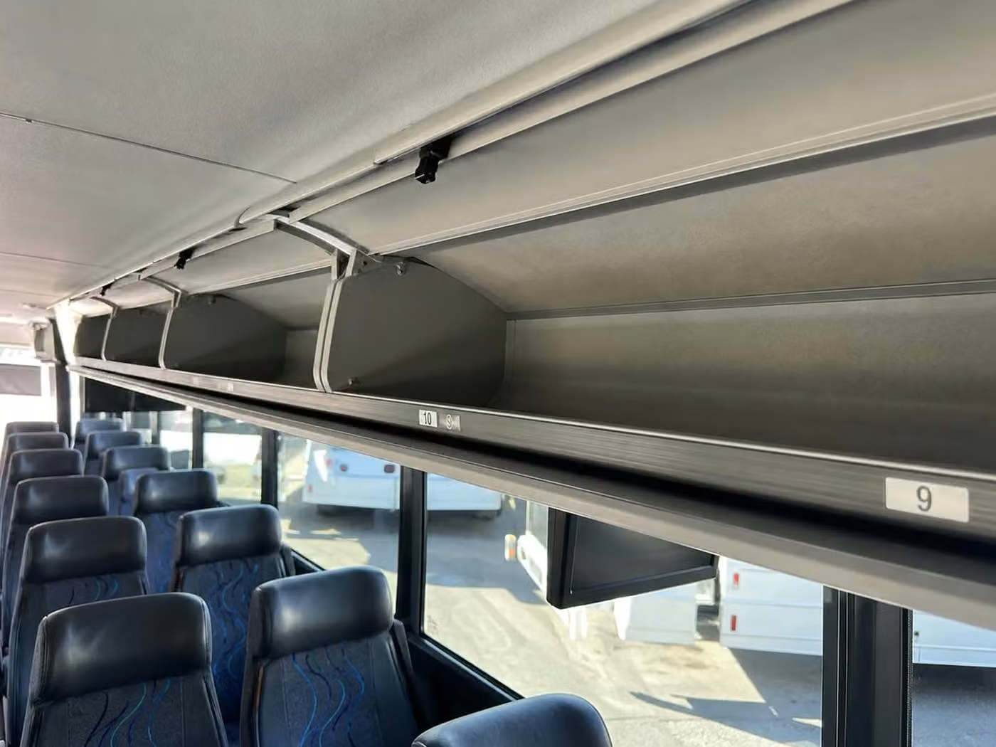 statesboro 25 passenger minibus overhead storage