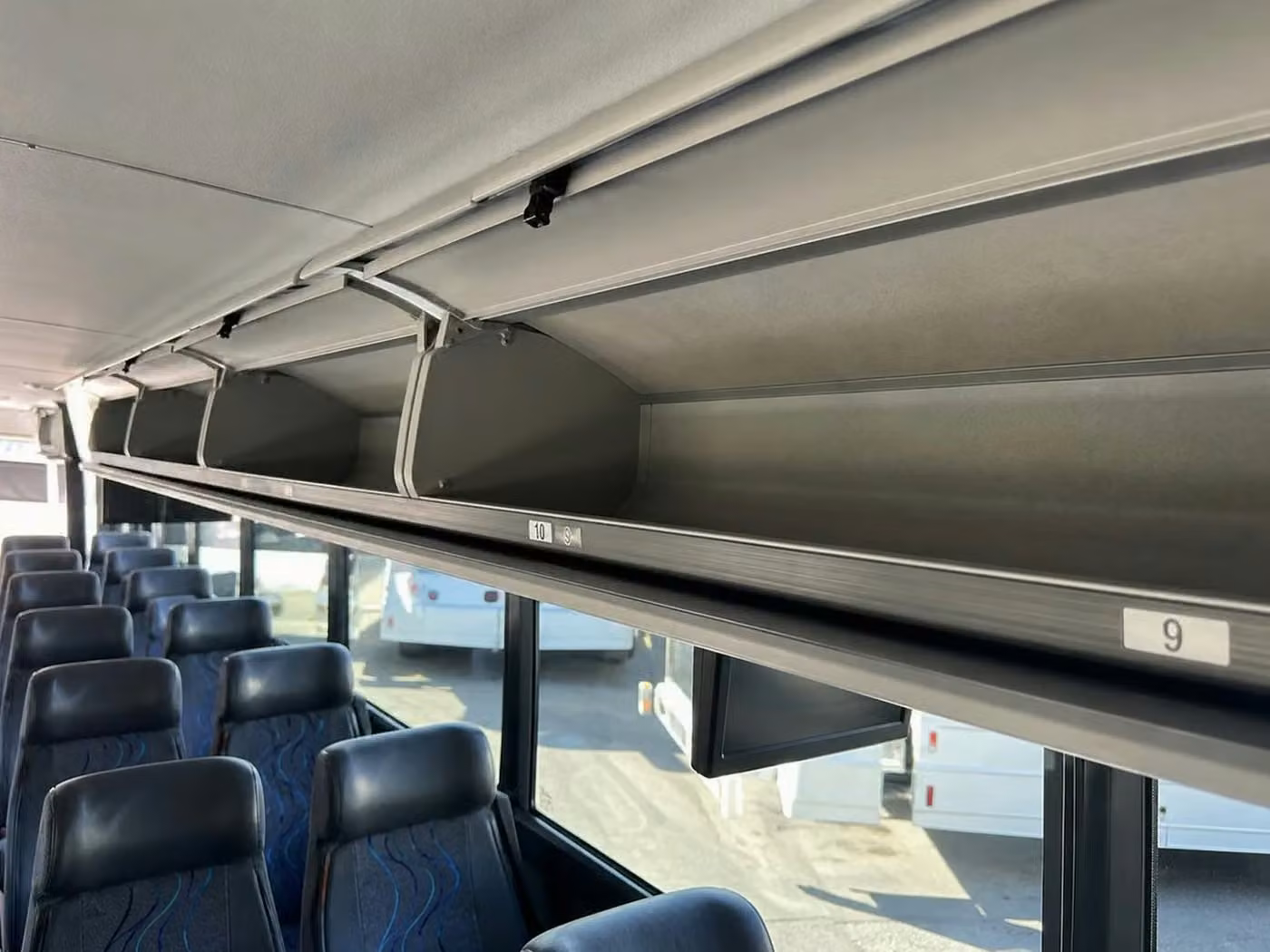 statesboro 35 passenger minibus overhead storage